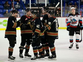 Vancouver Giants players celebrate an early-season goal against the visiting Kelowna Rockets at the Langley Events Centre. Three of the Giants’ five postponed games this season have had the Rockets as their opponents.