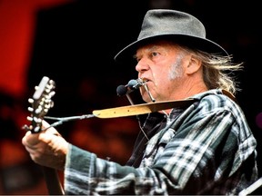 Canadian singer-songwriter Neil Young performs at the Orange Stage at the Roskilde Festival in Roskilde, Denmark, July 1, 2016.