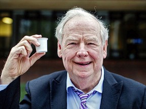 Calvin Sandborn holds up one of Keurig Canada's plastic coffee pods.