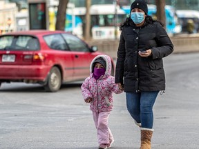 Montrealers continue to wear masks on Tuesday March 29, 2022 as COVID-19 cases surge.
