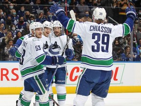 Alex Chiasson of the Vancouver Canucks celebrates a goal against the Toronto Maple Leafs during an NHL game at Scotiabank Arena on March 5, 2022 in Toronto.