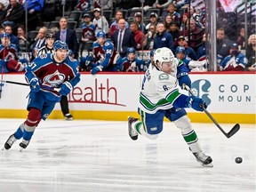 Brock Boeser of the Vancouver Canucks shoots and scores a third period goal against the Colorado Avalanche at Ball Arena on March 23, 2022 in Denver, Colorado.