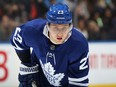 Travis Dermott #23 of the Toronto Maple Leafs waits for a faceoff against the Nashville Predators during an NHL game at Scotiabank Arena on November 16, 2021 in Toronto.