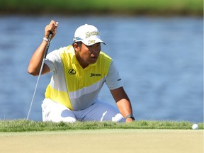 Hideki Matsuyama of Japan looks over a putt on the 13th green during the final round of the Arnold Palmer Invitational presented by Mastercard at Arnold Palmer Bay Hill Golf Course on March 06, 2022 in Orlando, Florida.