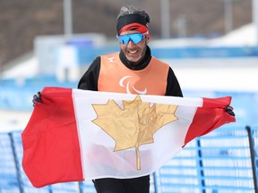 Canada's Brian McKeever poses after the Para cross-country open 4x2.5-kilometre relay during Day 9 of the Beijing 2022 Winter Paralympics at Zhangjiakou National Biathlon Centre on March 13.