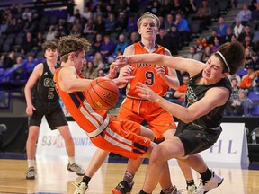 Unity Christian, in orange, defeated Glenlyon Norfolk 89-71 to win the 1A B.C. Boys Basketball Finals at the Langley Event Centre on Saturday, March 13, 2022. Photo: Paul Yates, Vancouver Sports Pictures