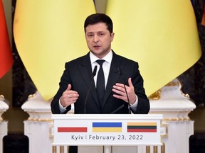 Ukrainian President Volodymyr Zelensky attends a joint press conference with his counterparts from Lithuania and Poland following their talks in Kyiv on February 23, 2022. (Photo by SERGEI SUPINSKY/AFP via Getty Images)