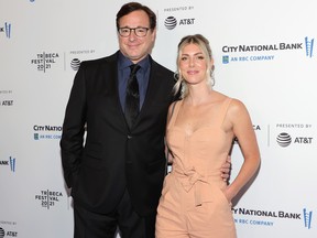 Bob Saget and Kelly Rizzo seen in 2021.
