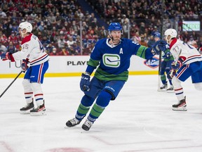 J.T. Miller, celebrating his goal during Wednesday’s four-point night against the Montreal Canadiens, says that while ‘it’s hard to avoid it entirely,’ he’s ignoring all the trade talk swirling around him and is focused on getting the Canucks into the playoffs.