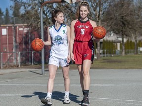 Emily Sussex, 17, a Grade 12 guard on the Terry Fox Ravens, and her sister Avery Sussex, 15, a Grade 10 guard  with the Riverside Rapids, face off in basketball provincials March 5.