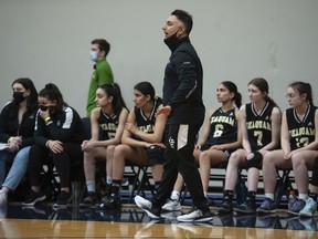 Seaquam Seahawks coach Lucky Toor and team take on the Walnut Grove Gators during the first day of the B.C. girls' basketball provincials at the Langley Events Centre on March 2.