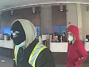 Surrey RCMP is seeking the public's help in identifying two men who robbed a bank in Fleetwood on March 9, 2022.