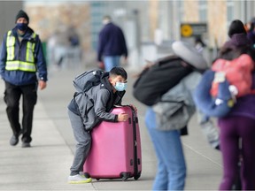 International travellers at Vancouver International Airport (YVR) as the federal government are set to announce that vaccinated travellers will no longer require a negative COVID-19 test to come to Canada.
