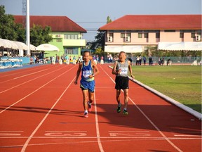 102-year-old gold medallist sprinter Sawang Janpram in action during the Men's 100m during the 26th Thailand Master Athletes Championship games in Samut Songkhram province, Thailand on February 27, 2022.