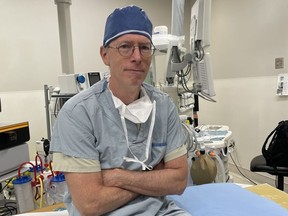 Dr. Chris Honey in the operating room at UBC hospital, April 12 2022, after a day of brain surgery for a patient with Parkinson's Disease. Photo credit: David Macdonald