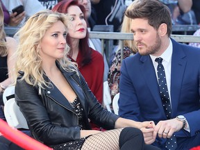 Michael Buble and wife Luisana Lopilato attend his being honored with a Star on the Hollywood Walk of Fame on Nov. 16, 2018 in Hollywood, California.