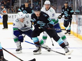 Consider Seattle Kraken forward Jared McCann, here fending off Canucks captain Bo Horvat, as the one who got away. The 2014 first-round draft pick got dealt away by Vancouver to Pittsburgh in a short-sighted trade for defenceman Erik Gudbranson.
