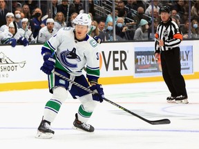 Jack Rathbone, pictured early this season in a Vancouver Canucks game, has scored 10 goals and added 30 assists in 40 games for the AHL Abbotsford affiliate.