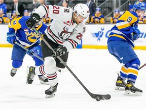 Vancouver Canucks prospect Arshdeep Bains (20) in action this season with the WHL's Red Deer Rebels.