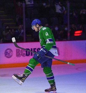 Abbotsford Canucks forward and Vancouver prospect Danila Klimovich celebrates after scoring a goal last season.