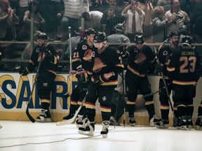Vancouver Canucks players including Cliff Ronning (in front), moments after losing Game 7 of the Stanley Cup Final series to the New York Rangers on June 14, 1994 at New York’s Madison Square Garden.