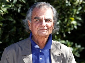 French fashion photographer Patrick Demarchelier poses at the first annual UNICEF Women of Compassion Luncheon in Los Angeles, Calif., Feb. 11, 2011.