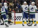 Vancouver Canucks center Elias Pettersson, second from right, celebrates after scoring against the Vegas Golden Knights during the second period of an NHL hockey game Wednesday, April 6, 2022, in Las Vegas.