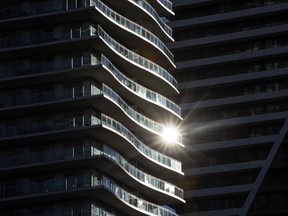 The sun reflects off a condominium in Toronto. Sales of condominiums priced above $4 million climbed 160 per cent in the region in the first quarter of 2022, compared to last year.