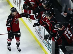 Giants defenceman Mazden Leslie celebrating his goal on Saturday with the Vancouver bench.