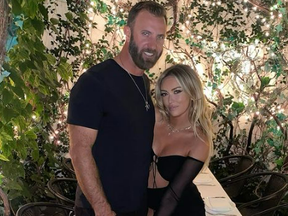 PGA star Dustin Johnson and hockey heiress Paulina Gretzky are pictured in a photo posted to her Instagram on Dec. 21, 2021.
