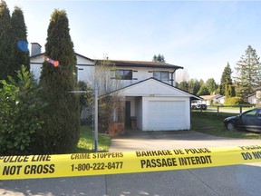 RCMP attend 15262 24 Ave. following a shooting which resulted in one man being taken to hospital with gunshot wounds and subsequently dying from his injuries in Surrey, BC., on April 6, 2022. (NICK PROCAYLO/PNG)