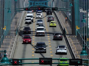 Traffic crosses the Lions Gate Bridge on May 28, 2018.