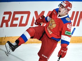 ‘His offensive skills put together makes him a devastating player with the puck,’ Will Scouch of McKeen’s Hockey says of Andrei Kuzmenko (above, playing for Russia at the Channel One Cup of the Euro Hockey Tour in December 2020).
