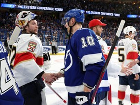 Sergei Bobrovsky #72 of the Florida Panthers shakes hands with Corey Perry #10 of the Tampa Bay Lightning after Game Four of the Second Round of the 2022 Stanley Cup Playoffs at Amalie Arena on May 23, 2022 in Tampa, Florida.