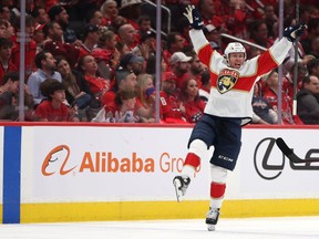 Carter Verhaeghe #23 of the Florida Panthers celebrates after scoring the game-winning goal against the Washington Capitals during overtime in Game Four of the First Round of the 2022 Stanley Cup Playoffs at Capital One Arena on May 09, 2022 in Washington, DC.
