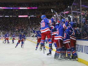 Artemi Panarin #10 of the New York Rangers celebrates his game winning overtime goal against the Pittsburgh Penguins in Game Seven of the First Round of the 2022 Stanley Cup Playoffs at Madison Square Garden on May 15, 2022 in New York City.