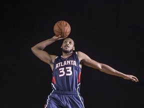 Adreian Payne of the Atlanta Hawks poses for a portrait during the 2014 NBA rookie photo shoot at MSG Training Center on August 3, 2014 in Tarrytown, New York.