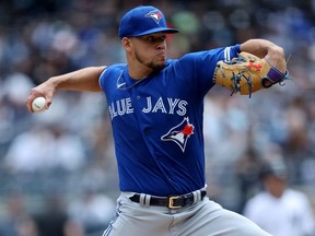 May 11, 2022; Bronx, New York, USA; Toronto Blue Jays starting pitcher Jose Berrios pitches against New York Yankees during the first inning at Yankee Stadium.