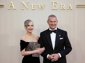 Cast members Elizabeth McGovern and Hugh Bonneville arrive for the world premiere of 'Downton Abbey: A New Era' in London, April 25, 2022.