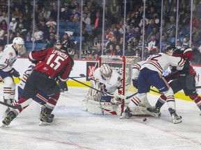 Vancouver Giants Jaden Lipinski and Fabian Lysell put pressure on during the second period of Game 5 against the Kamloops Blazers in the WHL playoff series at the Sandman Centre in Kamloops May 13, 2022. Allen Douglas photo