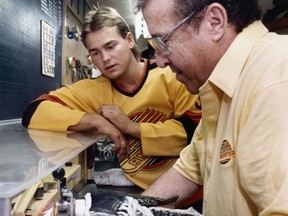 Then-Canucks winger Stu Kulak gets some skate-sharpening tips from trainer Ken Fleger in September 1986. Kulak is the last WHL B.C.-based franchise player (in Kulak’s case, the Victoria Cougars) to score a goal for Vancouver.
