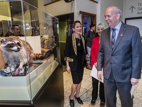 Premier John Horgan, with Tourism Minister Melanie Mark (left) and Royal B.C. Museum board director Carole James in tow, at last Friday’s museum funding announcement in Victoria.