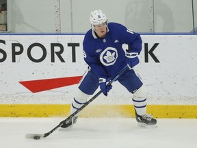 Toronto Maple Leafs winger Mitch Marner looks to make a pass during practice in Toronto on April 1, 2022.