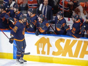 Edmonton Oilers Evander Kane (91) celebrates his second goal of the period with teammates against the Calgary Flames during second period NHL second round playoff hockey action on Sunday, May 22, 2022 in Edmonton.