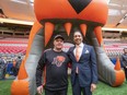 From left:  Head coach Rick Campbell, Amar Doman BC  Lions owner.