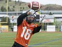 Veteran receiver Bryan Burnham, hauling in a pass at Lions camp in Kamloops in 2019, says everyone was ‘very relieved’ to see the players ratify a revised, seven-year collective bargaining agreement with the CFL.