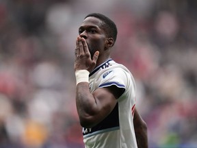 Vancouver Whitecaps' Tosaint Ricketts blows a kiss to the crowd as he celebrates his goal against Toronto FC during the second half of an MLS soccer game in Vancouver, BC on Sunday May 8, 2022.