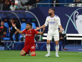 Liverpool v Real Madrid - Stade de France, Saint-Denis near Paris, France - May 28, 2022
Liverpool's Luis Diaz reacts after being fouled by Real Madrid's Dani Carvajal REUTERS/Kai Pfaffenbach