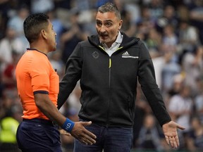 May 28, 2022; Kansas City, Kansas, United States; Vancouver Whitecaps head coach Vanni Sartini reacts after playing against Sporting Kansas City in the first half at Children's Mercy Park.