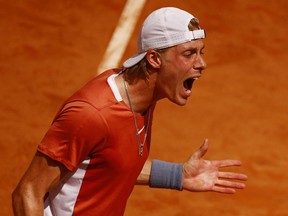Canada's Denis Shapovalov reacts during his first round match against Italy's Lorenzo Sonego